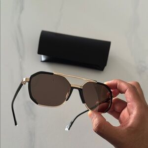 GRANT 

Stylish Black and Gold Sunglasses